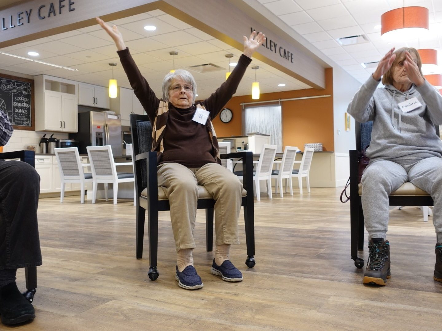 Senior exercising in chair